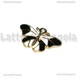 Ciondolo Farfalla in metallo dorato smaltato bianco nero 24x17mm