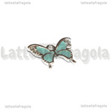 Ciondolo Farfalla con strass in metallo argentato smaltato azzurro 19x15mm