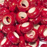 Perla in ceramica rosso effetto perlato 13x6mm